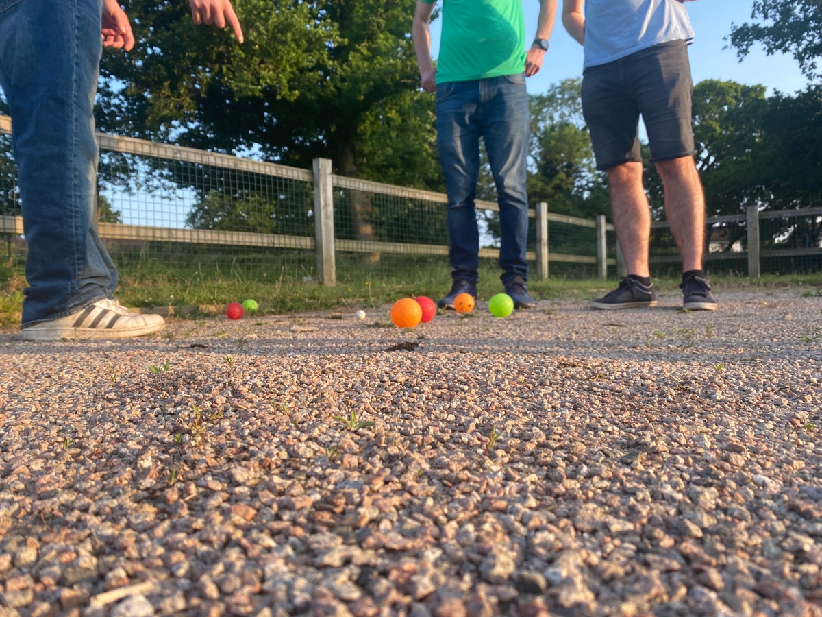  People playing Street Boules